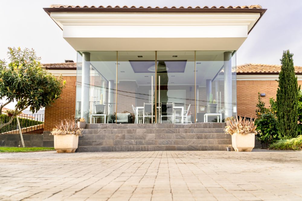 close up of house entry with porch and garden low a27txmn.jpg